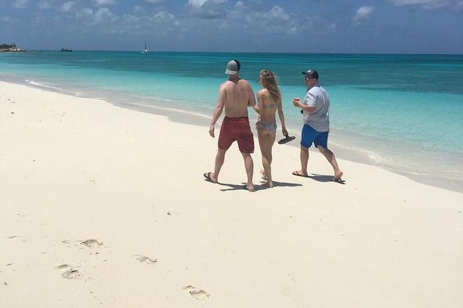 4-Hour Catamaran Sail and Snorkel Tour from Grace Bay - Half Moon Bay offers an easy island walk