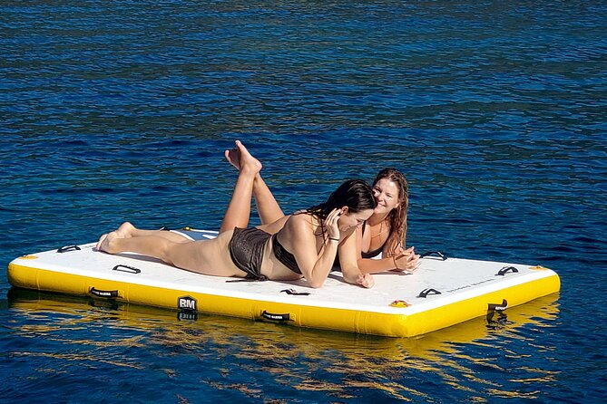 6 hours sailing tour with audio guides and typical Sardinian cuisine - Porto Conte and the southern route options
