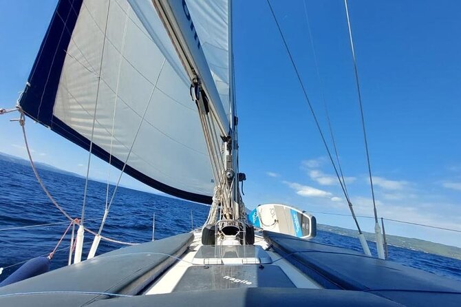 6 Hours Tour to Delos and Rhenia Islands with Sailing Yacht - Exploring Delos, the ancient center of the day