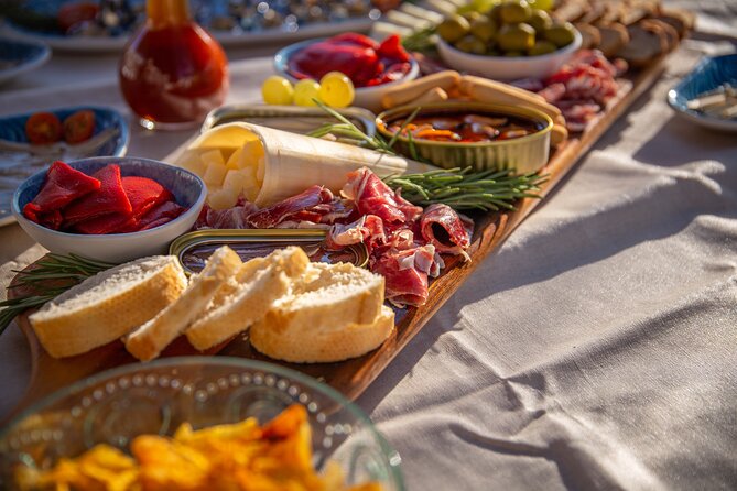 A 2 hours Local Tapas and sailing adventure in Barcelona - Espinaler seafood, charcuterie, and local tapas