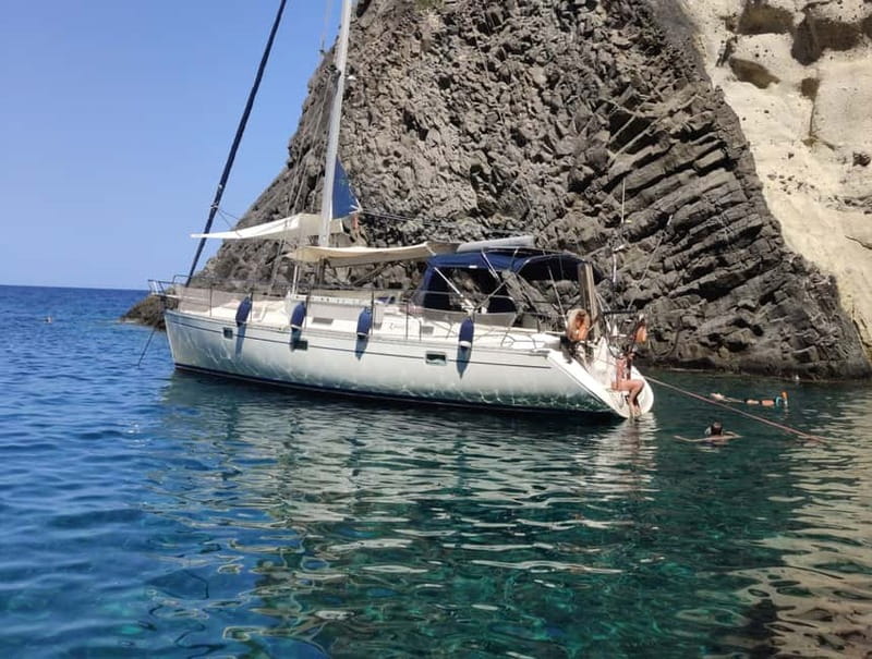 Adamantas: Kleftiko Sailing Cruise with Meal and Swim Stops - Sykia’s open-roof cave