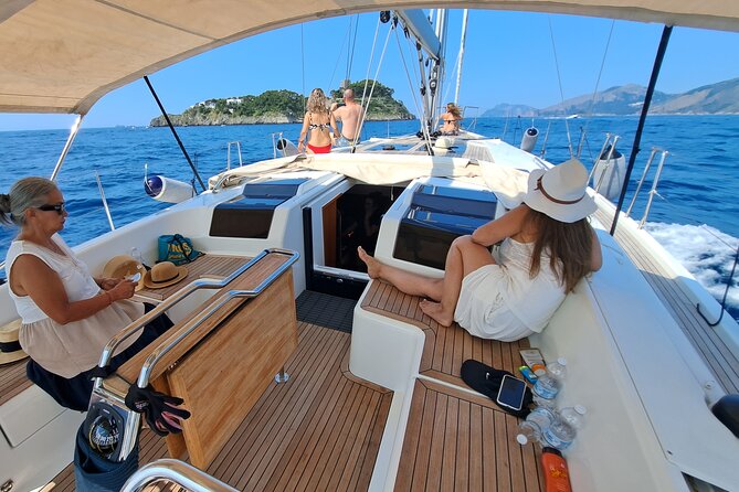 Amalfi Skip the Crowds Private Chill Experience on a Sail Yacht - Amalfi’s cliffs and the Natural Arch