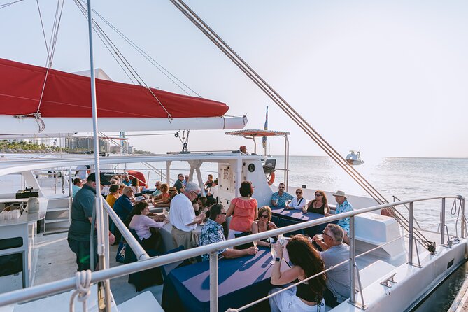 Aruba Sunset Sail Dinner Cruise with Open Bar by Catamaran - The First Toast and the View Along Aruba’s Coast