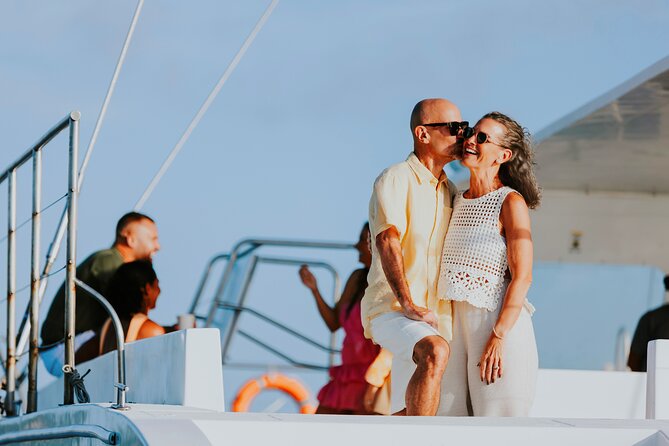 Aruba Sunset Sail Experience - Booking, Weather, and Cancellation Details