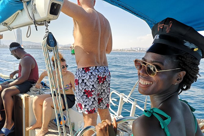 Authentic Barcelona Sailing Tour with Swim & Drinks - Port Olímpic and Barcelona’s modern waterfront