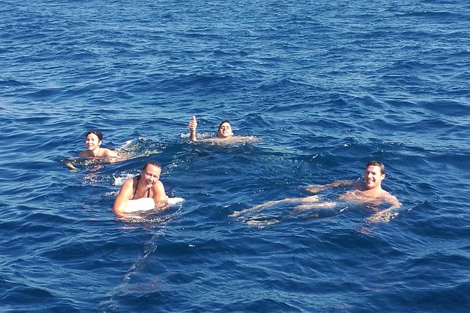 Authentic Barcelona Sailing Tour with Swim & Drinks - Pont del Petroli and the swimming break