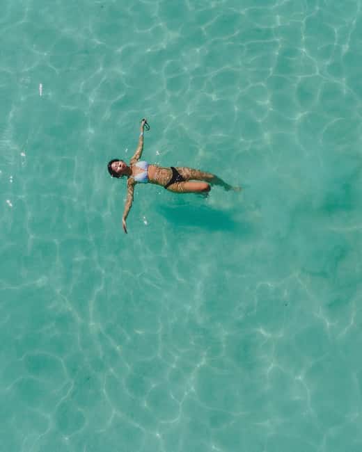 Bacalar Lagoon Sailing Tour with Open Bar and Mexican Lunch - The lagoon’s colors and the first swimming stop
