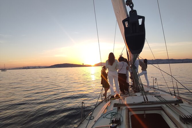 Barcelona Badalona Sailboat Tour Snack Drinks Swimming Sunset - Key points about this Badalona sailing trip
