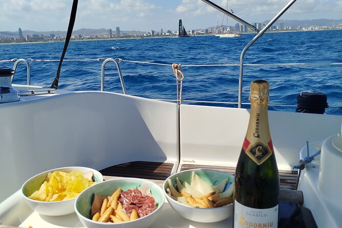 Barcelona Badalona Sailboat Tour Snack Drinks Swimming Sunset - Setting out from Moll Nord in Badalona