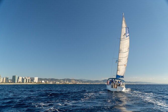 Barcelona Coastal Sailing (Open Bar, Catalan Snack & Swim Stop) - Open bar, music, and Catalan snacks