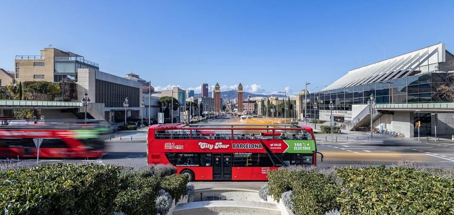 Barcelona: Hop-On Hop-Off Bus with Sailing Cruise - Taking the orange West route to Camp Nou and Montjuïc
