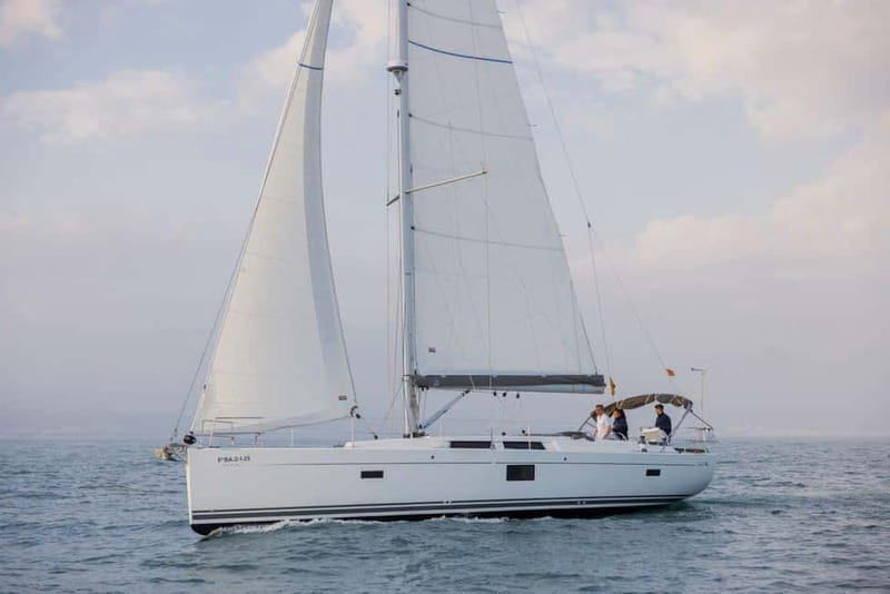 Barcelona: Luxury Sailing Experience from Port Olimpic - Montjuïc Castle and the Vela Hotel from offshore