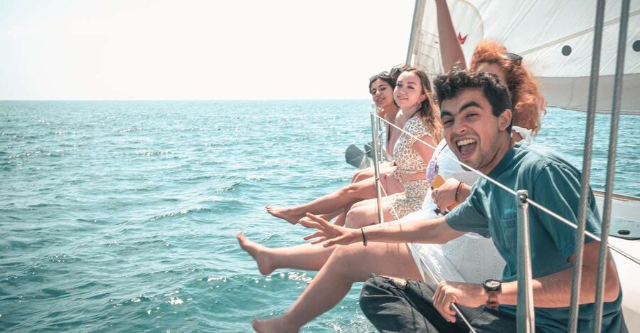 Barcelona: Midday or Sunset Sailing with Open Bar and Snacks - Three to four miles offshore, the city becomes the backdrop