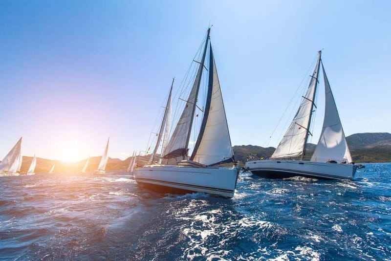 Barcelona: Sailing Tour + Food, Drinks, Swim & Sunset Option - Sailing past the city with room to relax