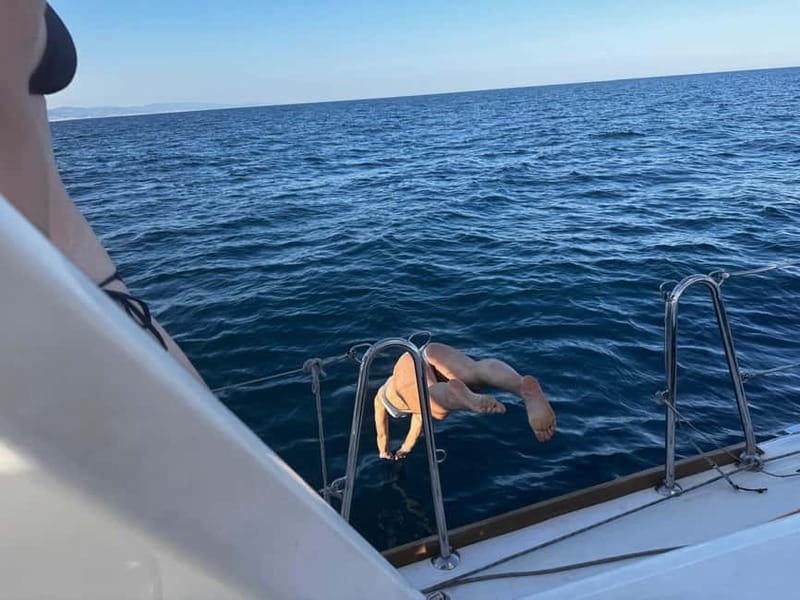 Barcelona: Sailing Tour + Food, Drinks, Swim & Sunset Option - Tapas, pinchos, and two drinks on board
