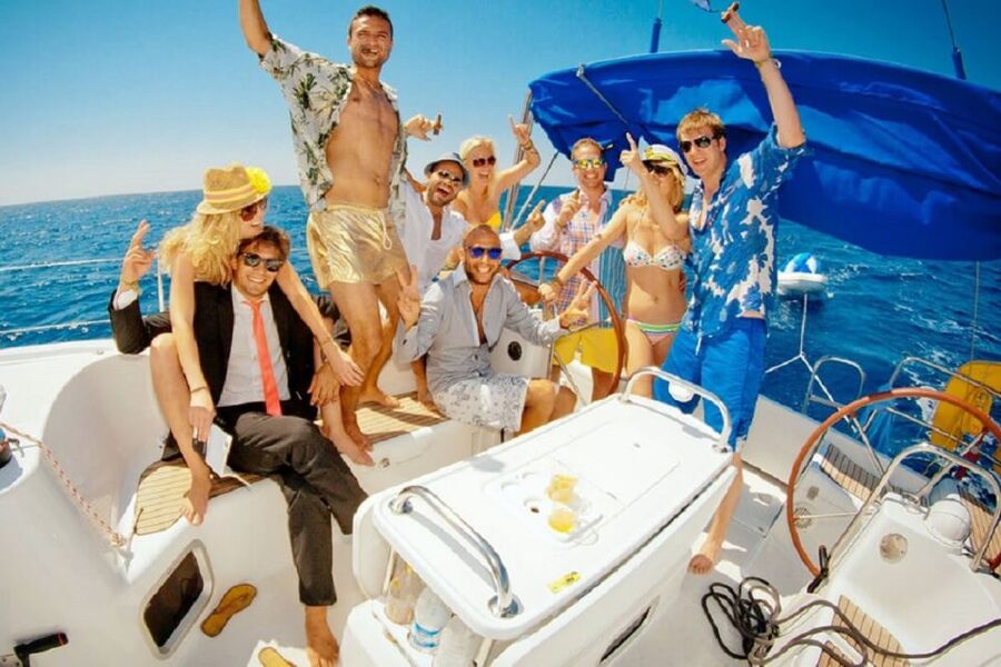 Barcelona: Sailing tour with open bar and aperitive - Setting sail from Barcelona’s blue and orange tent