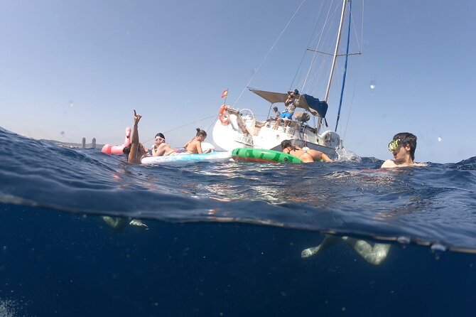 Barcelona Sailing Tour with Swimming, Snacks and Drinks - Swimming, paddle surf, and snorkeling
