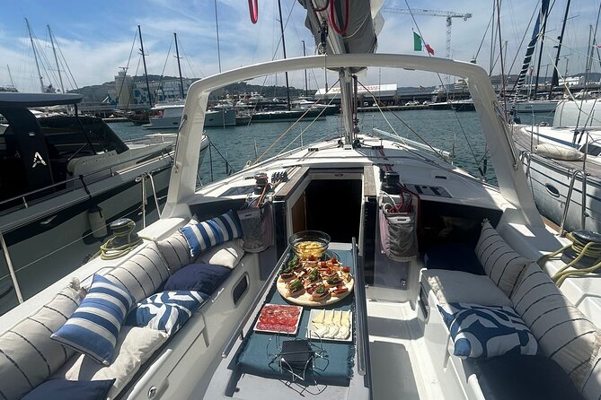 Barcelona: Sailing Tour with Tapas, Drinks, Swim & Sunset Option - Sailing past the Barcelona coast