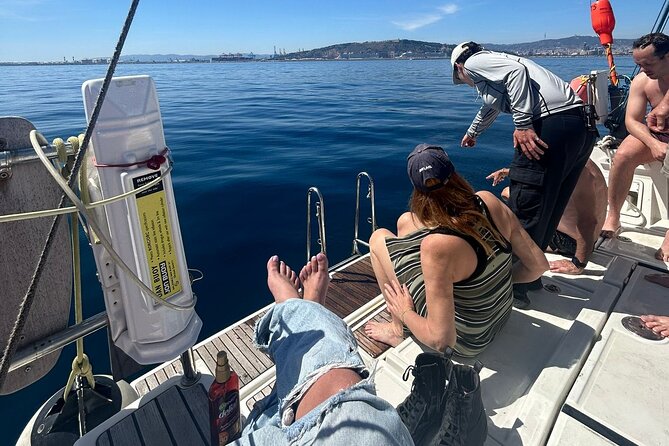 Barcelona: Sailing Tour with Tapas, Drinks, Swim & Sunset Option - The swim stop in the Mediterranean