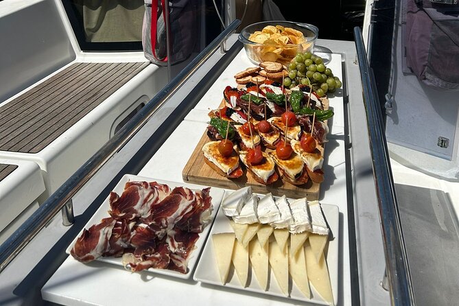 Barcelona: Sailing Tour with Tapas, Drinks, Swim & Sunset Option - Boat comfort, motion, and mobility concerns