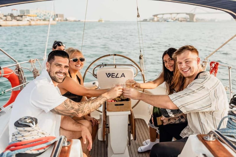 Barcelona: Sailing Tour with Young Local Captain & Drinks - Along Barceloneta with the city behind you