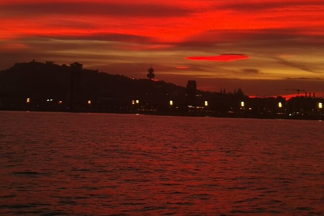 Barcelona Sunset Private Sailing & Live Spanish Guitar & open Bar - Guitar, drinks, and the open-bar rhythm