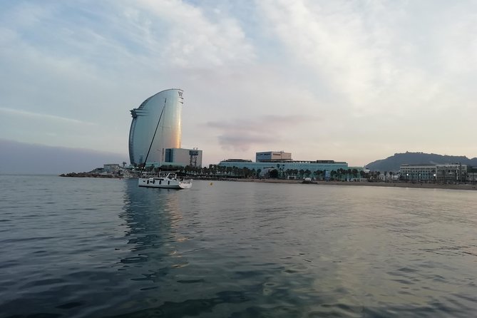 Barcelona Sunset Sailing Cruise from Port Olímpic with Open Bar - The Olympic Towers at sunset