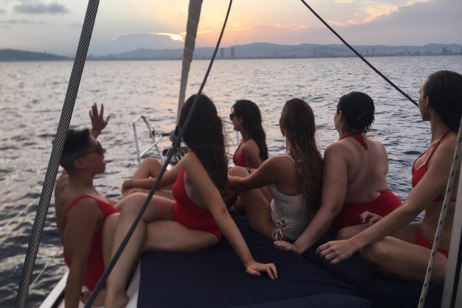 Barcelona Sunset Sailing with Open Bar of Cava and Snacks - Wind, Cold, and Seasickness
