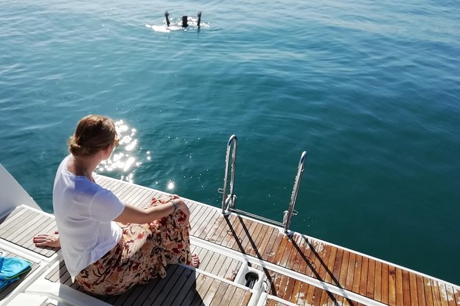 Barcelona Unforgettable Sailing Cruise with Open Bar and Snacks - Hoisting the sails beside Barceloneta
