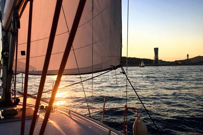 Barcelona Unique Sunset Sailing Experience with Tapas & Open Bar - Sunset, music, and the mood onboard