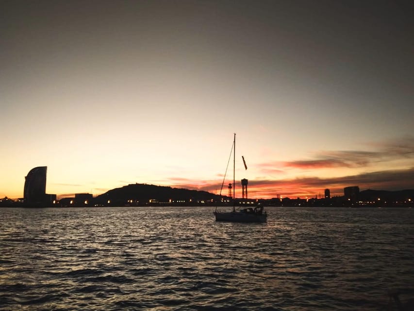 Barcelona: Unique Sunset Sailing Tour with Tapas & Open Bar - Setting out from Port Olimpic