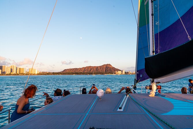 Board from Waikiki Beach for a scenic Sunset Sail on the Hāwea - The sunset hour and the onboard bar