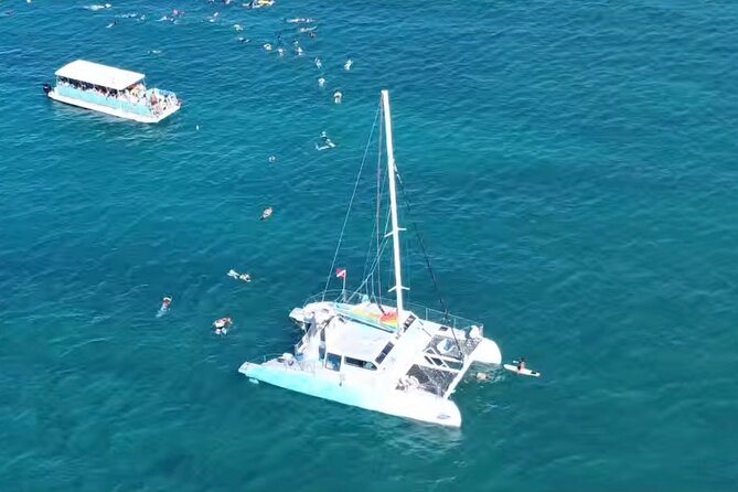 Board from Waikiki Beach for Aloha Hour Sail on Hāwea Catamaran - Drinks, music, and the Aloha Hour mood