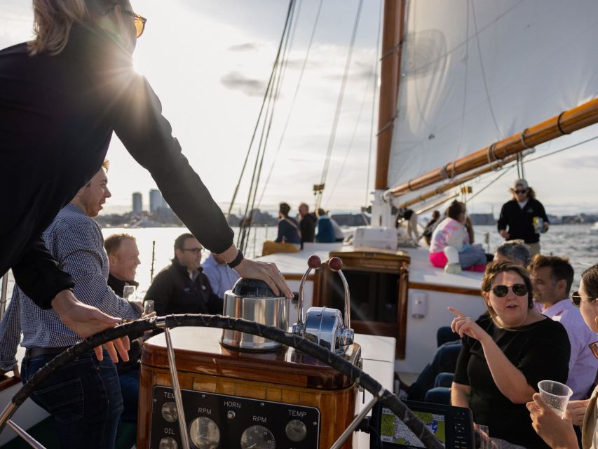 Boston: Harbor Champagne Sunset Sail from Rowes Wharf - Sunset, city lights, and the return ride