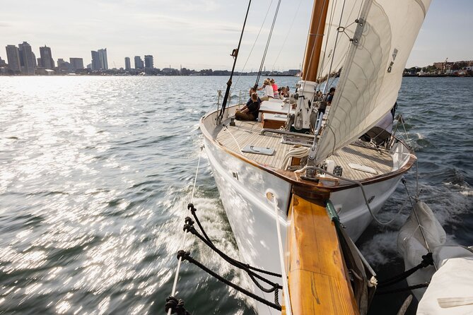 Boston Harbor Sunset Sail Tour - Sunset, skyline lights, and planes over Logan