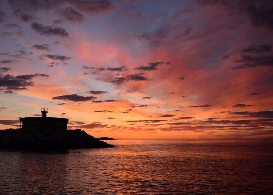 Cabo de Gata Natural Park: Sunset Sailing Tour with Cava - Sailing past volcanic cliffs and clear coves