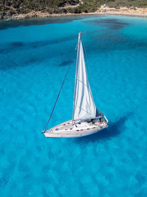 Cagliari: Mari Pintau Sailing Trip with Lunch & Snorkeling - Sella del Diavolo: first swim and the welcome aperitif