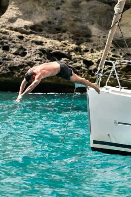 Cagliari: Sailing Tour with 4 Stops, Snorkeling and Prosecco - Cala Fighera and the best underwater break