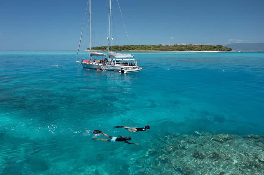 Cairns: Green Island & Great Barrier Reef Sailing Tour - The exclusive reef site and your first swim