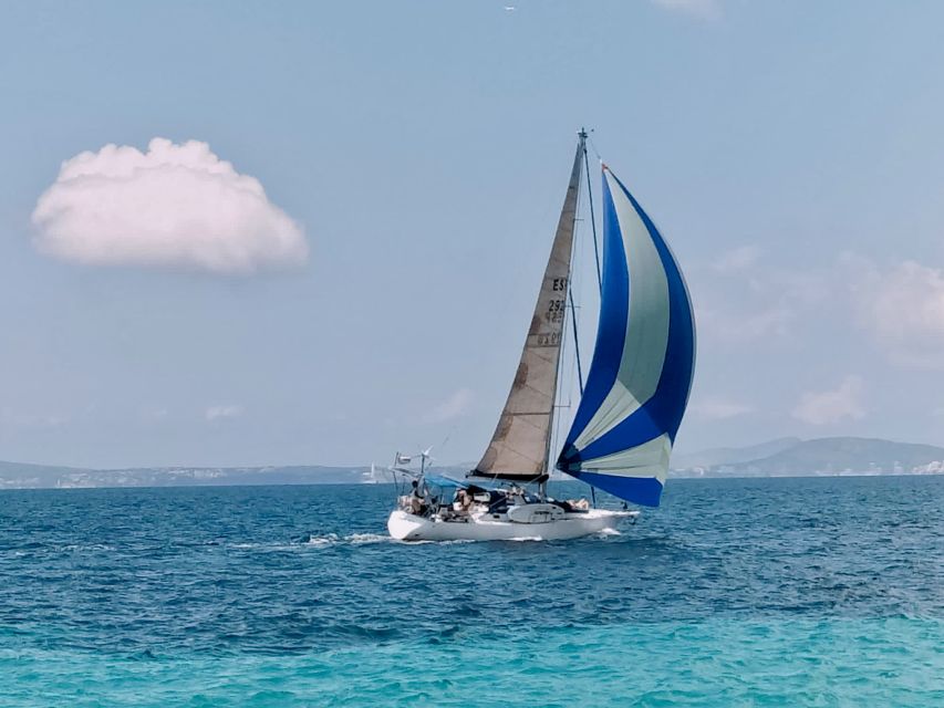 Can Pastilla: Sailboat Tour with Snorkeling, Tapas & Drinks - The first stretch across Palma Bay