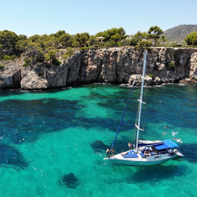 Can Pastilla: Sailboat Tour with Snorkeling, Tapas & Drinks - Cap Enderrocat and the first water stop