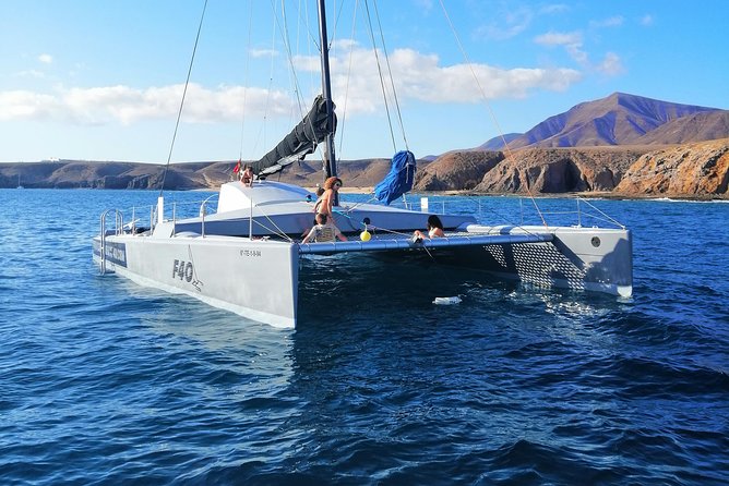 Catamaran F40 Lanzarote sailing - Papagayo and the swimming stop