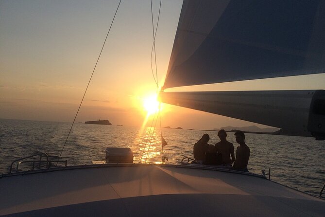Catamaran sailing at sunset with tapas Palma de Mallorca - Palma Cathedral from the water
