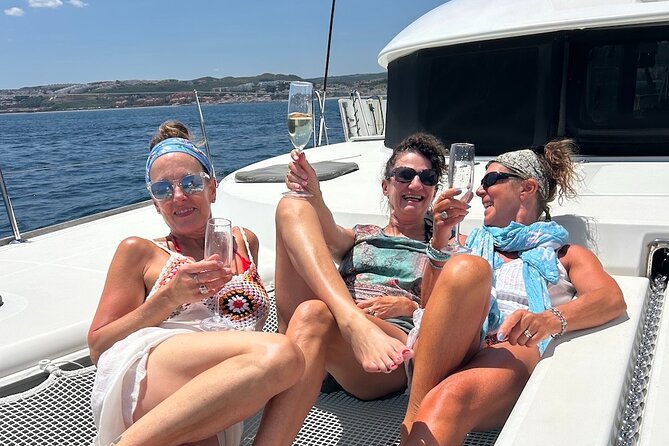 Catamaran Sailing Experience Manilva Tapas Drink Dolphins Swim Stop - Jens and Anja set the tone