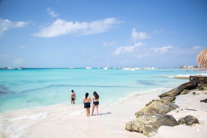 Catamaran Sailing to Isla Mujeres with Snorkeling, Lunch & Open Bar included - Lunch at the beach club: convenient, not a culinary highlight