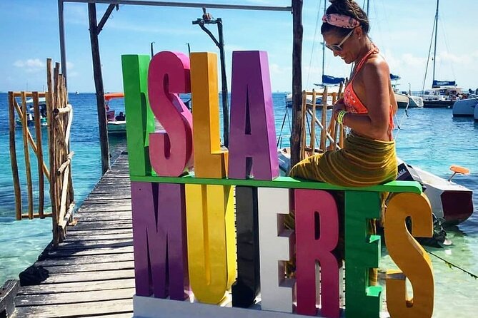Catamaran Sailing to Isla Mujeres with Snorkeling, Lunch & Open Bar included - Starting at the marina: arrive ready for a busy check-in