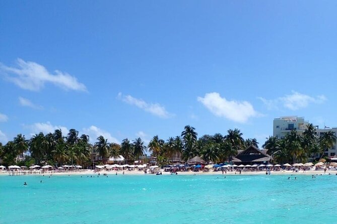 Catamaran sailing Tour to Isla Mujeres all inclusive - El Farito snorkeling stop