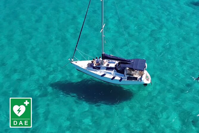 Catamaran tour stops bathing and snorkeling toast with prosecco - Passing the first bay and Capo Sant’Elia