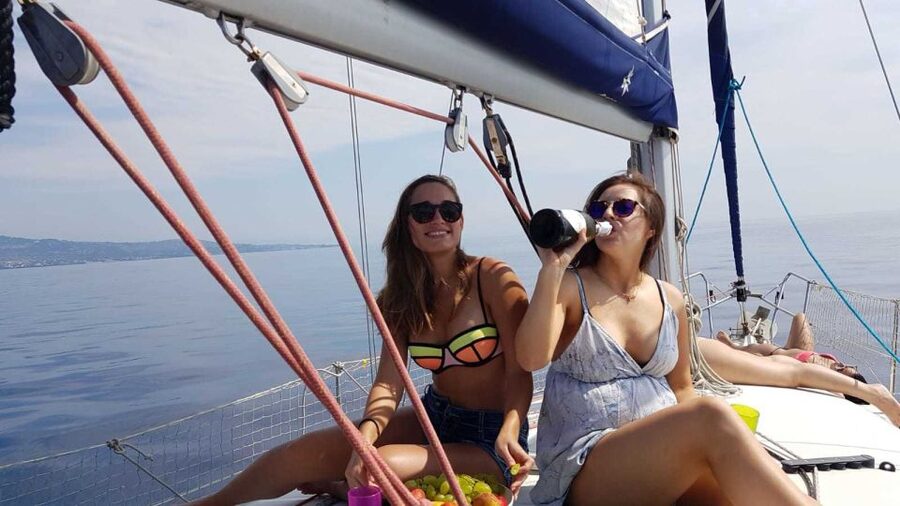 Catania: Spritz and Sunset Sailing Tour - The Ulysses caves and Aci Castello
