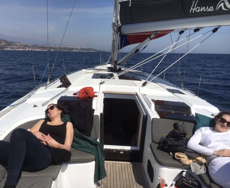 Catania: Spritz and Sunset Sailing Tour - Swimming and snorkeling in the Sicilian sea